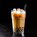 Iced boba tea with tapioca pearls and straw on a dark background Royalty Free Stock Photo