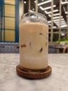 Iced Caffee Latte on Marble Table with Elegant Cafe Ambiance