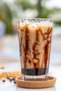 Iced caramel latte coffee in a tall glass with caramel syrup Royalty Free Stock Photo