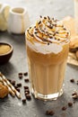 Iced caramel latte coffee in a tall glass Royalty Free Stock Photo