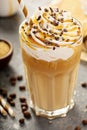 Iced caramel latte coffee in a tall glass Royalty Free Stock Photo