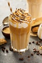 Iced caramel latte coffee in a tall glass Royalty Free Stock Photo