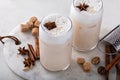 Iced chai latte with warm winter spices topped with milk foam Royalty Free Stock Photo