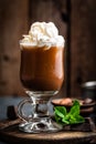 Iced cocoa drink with whipped cream, cold chocolate beverage, coffee frappe on dark background Royalty Free Stock Photo