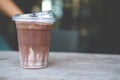 Iced cocoa in plastic cup with lid. You can drink coffee pass lid