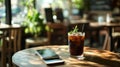 Coffee Break Iced Coffee and Smartphones on a Wooden Table in a Cafe Royalty Free Stock Photo