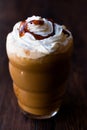 Iced Coffee Caramel Frappe / Frappuccino with Whipped Cream and Caramel Syrup. Royalty Free Stock Photo