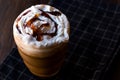 Iced Coffee Caramel Frappe / Frappuccino with Whipped Cream and Caramel Syrup. Royalty Free Stock Photo