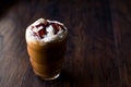 Iced Coffee Caramel Frappe / Frappuccino with Whipped Cream and Caramel Syrup. Royalty Free Stock Photo