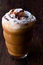 Iced Coffee Caramel Frappe / Frappuccino with Whipped Cream and Caramel Syrup. Royalty Free Stock Photo