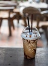 Iced coffee with caramel syrup and whipped cream Royalty Free Stock Photo