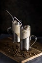 Iced coffee chillers in tall glass mugs with coffee beans