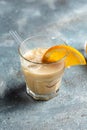 Iced coffee. Cold refreshment summer coffee drink in glasses on concrete stone background. vertical image. place for text