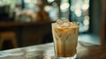 Iced coffee cubes with milk. Glass of cold coffee with ice cubes Royalty Free Stock Photo