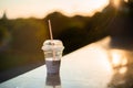 Iced Coffee Cup in Sunset Light Royalty Free Stock Photo