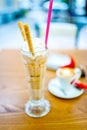 Iced coffee, frappe, with whipped cream, almonds cream Royalty Free Stock Photo