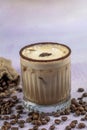 Iced coffee or latte in glass cup. Glass of Cold Iced Coffee put on wood table Royalty Free Stock Photo