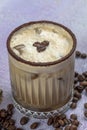 Iced coffee or latte in glass cup. Glass of Cold Iced Coffee put on wood table Royalty Free Stock Photo