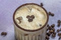 Iced coffee or latte in glass cup. Glass of Cold Iced Coffee put on wood table Royalty Free Stock Photo