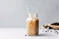 iced coffee latte in a jar, with straw and label for easy take-away