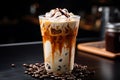 Iced Coffee Latte with Milk Mixture and Cream Topping Chocolate Sauce Served in Clear Glass Royalty Free Stock Photo