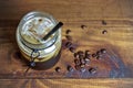 iced coffee with a lot of ice in a canning jar, idea of recycling. Summer drink