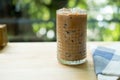 Iced coffee mocha in a tall glass in coffee shop Royalty Free Stock Photo