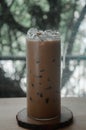 Iced coffee mocha in a tall glass. Selective focus Royalty Free Stock Photo