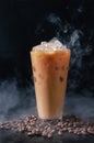 Iced Coffee wiht Milk in Tall Glass and Coffee Beans on Dark Background. Concept Refreshing Summer Drink Royalty Free Stock Photo