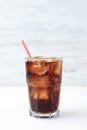 Iced Cola on Tall Glass with Red Stripes Paper Straw