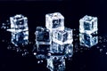 Iced cubes melting on a blue table with reflection. Water. Melting of ice. Royalty Free Stock Photo