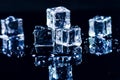 Iced cubes melting on a blue table with reflection. Water. Melting of ice. Royalty Free Stock Photo