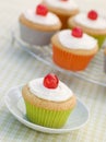 Iced Cup Cakes with Glace Cherries Royalty Free Stock Photo