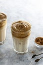 Iced dalgona coffee, frothy creamy whipped coffee cold drink