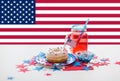 iced donut with american flag decoration and juice