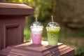 Iced green tea matcha latte and Pink strawberry milk shake on summer Royalty Free Stock Photo