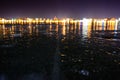 Iced lake at night city