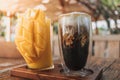 Iced latte coffee and mango juice drinks in concept of summer. Royalty Free Stock Photo