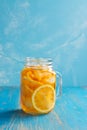 Iced lemon tea on blue background