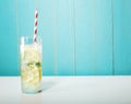 Iced lemonade with big red striped straws Royalty Free Stock Photo