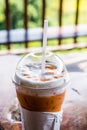 Iced Milk Tea in Plastic Glass with Natural View Royalty Free Stock Photo