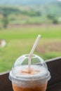 Iced Milk Tea in Plastic Glass with Natural View Royalty Free Stock Photo