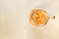 Iced milk tea, Thai Ice Tea on bright wooden background.