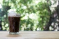 Iced Mocha coffee with homemade square ice cubes on the table