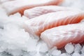 Raw cod fish fillets with ice Royalty Free Stock Photo