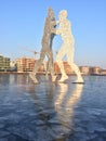 Iced river Spree with the popular landmark Molecule Man in Berlin Royalty Free Stock Photo