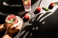 Iced strawberry tea. A refreshing and healthy drink for hot summer days. Homemade strawberry tea poured over ice cubes Royalty Free Stock Photo