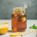 Iced tea with fresh herbs in jar with splashes Royalty Free Stock Photo