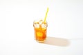 iced tea glass casting shadow on white surface Royalty Free Stock Photo