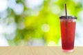 Iced tea on green nature background Royalty Free Stock Photo